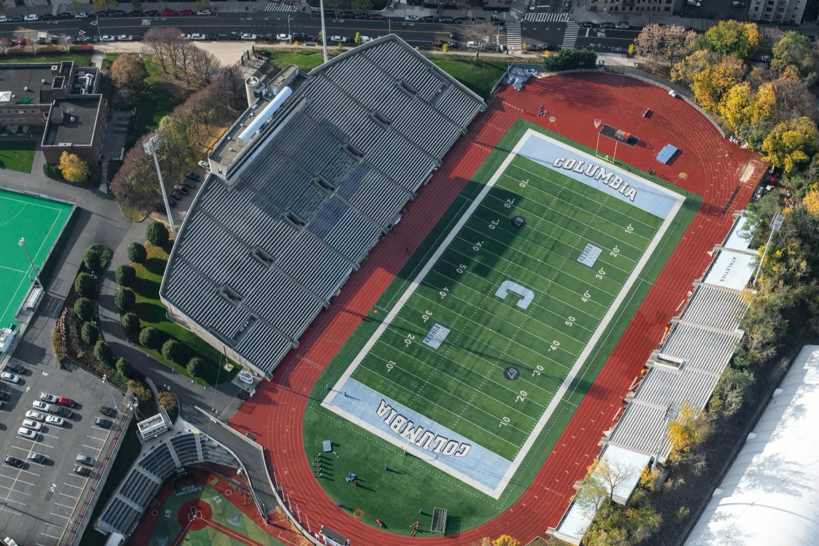 A college track and field stadium with an all-weather track surface and field event areas